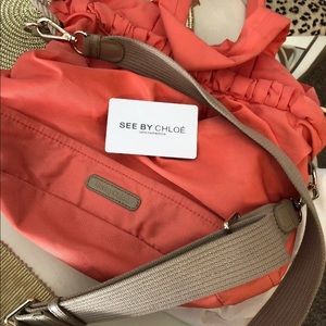 See by Chloé top handle and cross body coral bag